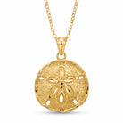 [group: gold-plated] A gold necklace featuring a textured, circular sand dollar pendant on a delicate gold chain, set against a plain white background.