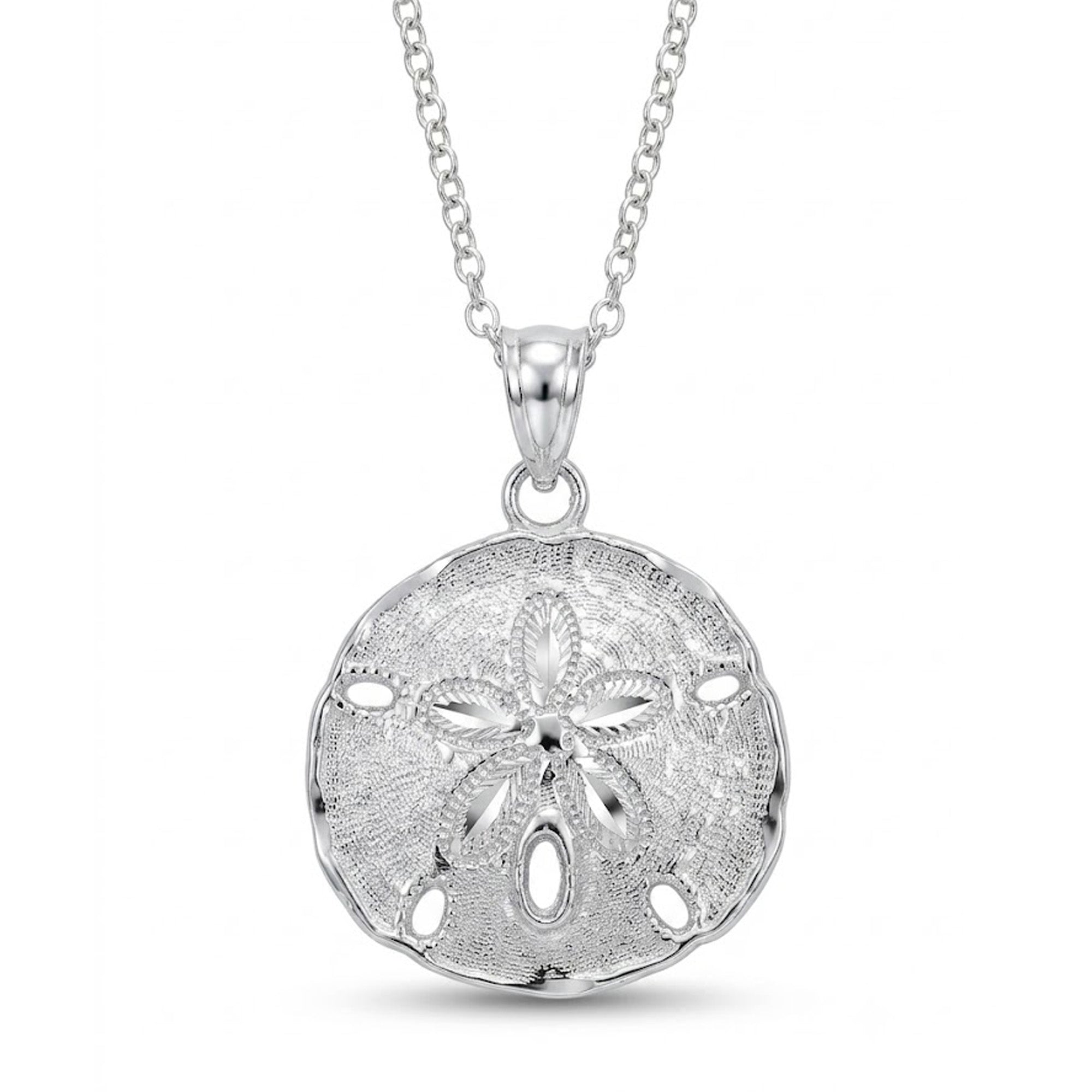 [group: silver] A sterling silver sand dollar pendant necklace on a delicate link chain, shown against a clean white background.