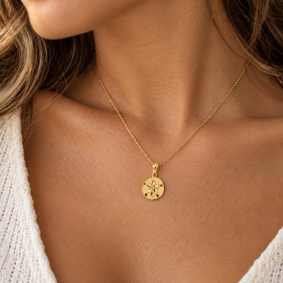 [group: large] gold sand dollar pendant 