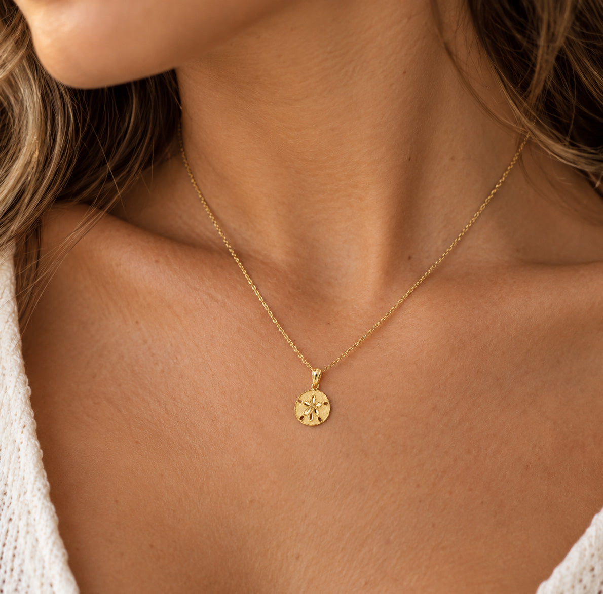 [group: small] gold sand dollar pendant 