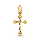 Gold cross pendant on a white background