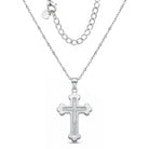 [group:silver]Silver cross pendant necklace on a white background