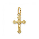 Gold crucifix pendant on a white background