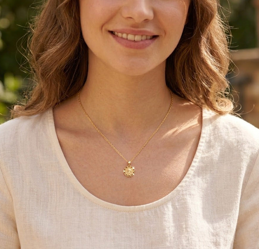 [group:gold-plated] gold plated baptism cross pendant  on model 