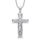 A silver crucifix pendant necklace featuring an intricate filigree design and a detailed figure of Jesus Christ, suspended from a matching silver chain against a plain white background.