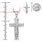 Silver crucifix pendant necklace with an engraved Jesus Christ design, shown with a 37mm height measurement, a US quarter coin for scale, and a close-up inset of the cross on a white background.