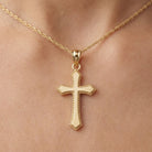 Gold Cross Pendant on gold rope chain 