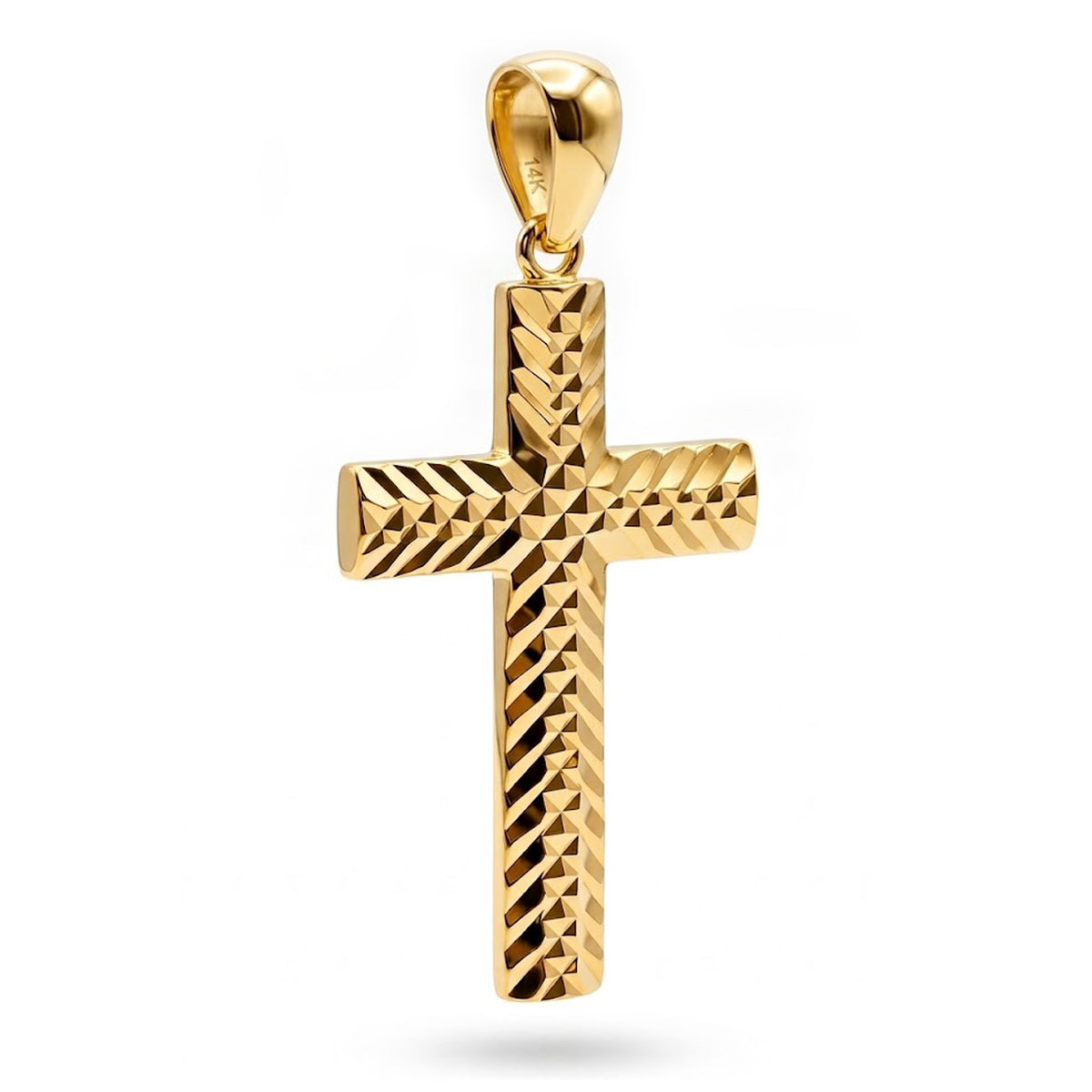 A textured yellow gold cross pendant with a diamond-cut pattern and a polished bail, shown on a clean white background.
