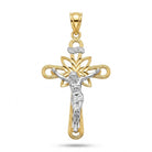 A two-tone gold and silver crucifix pendant featuring a detailed silver corpus of Jesus Christ on a gold cross with a floral motif and 'INRI' inscription, shown on a white background.