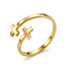 A polished gold-plated open wrap ring with two small cross-shaped protrusions, shown on a clean white background.
