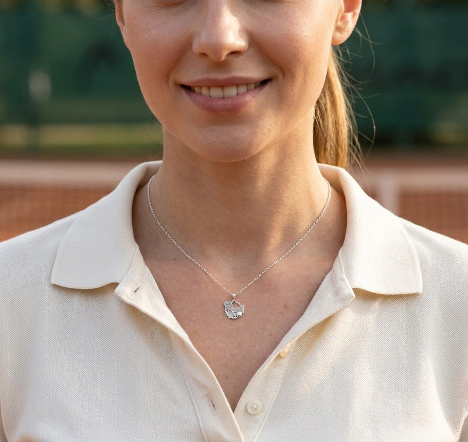 [group:silver] Female model wearing silver tennis pendant necklace 