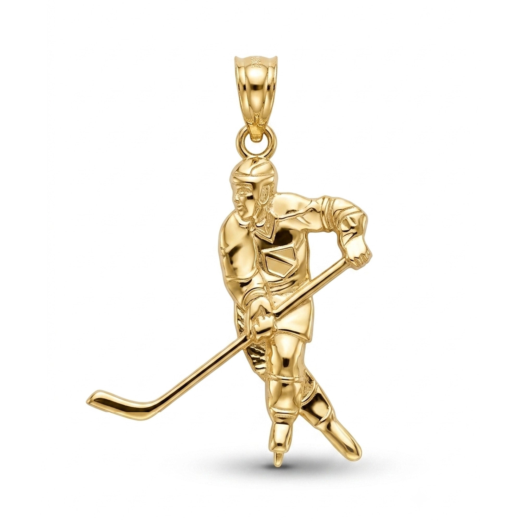 A polished yellow gold hockey player pendant on a clean white background.