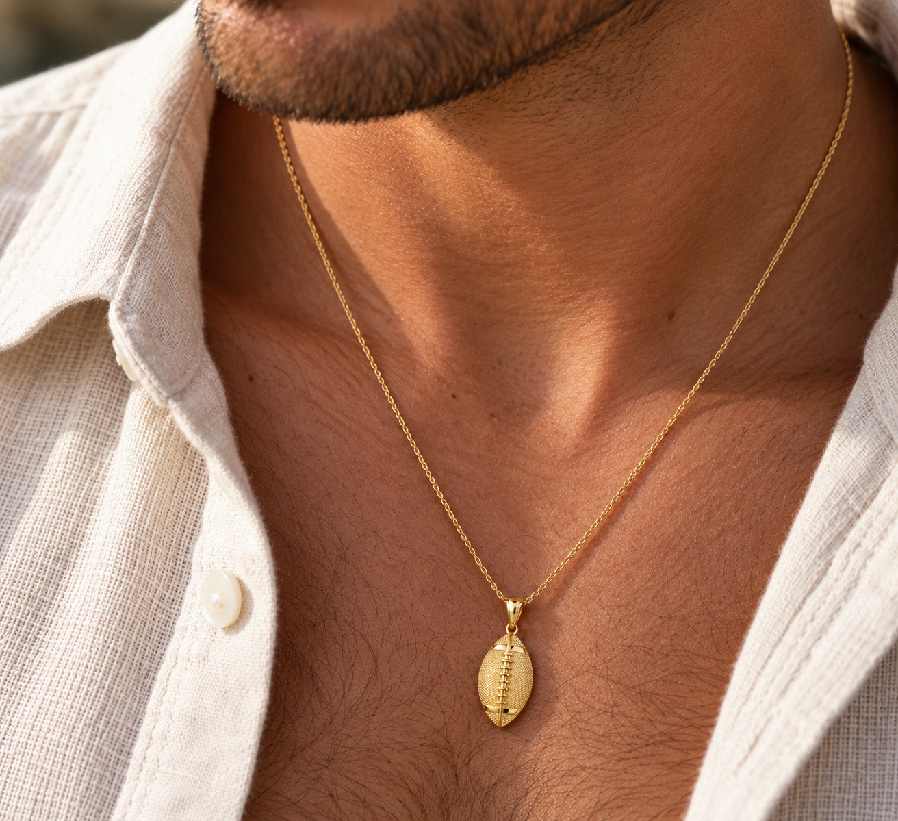 Gold Football Pendant