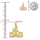 [group:10k-gold]  Gold 'DAD' pendant with size measurement against a quarter for scale on a white background