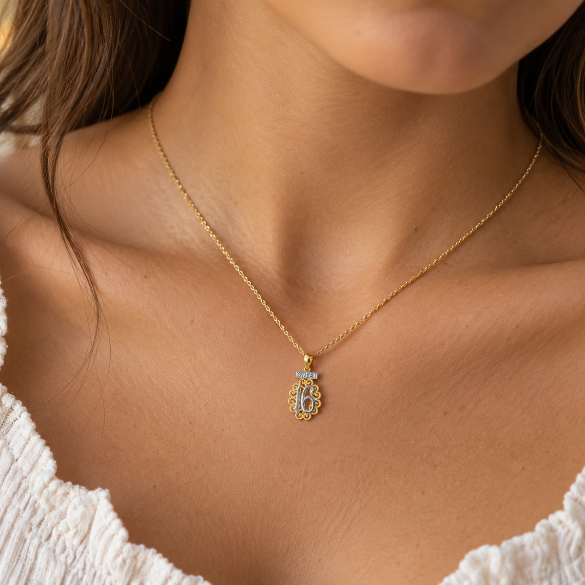 [group:small] gold sweet 16 pendant