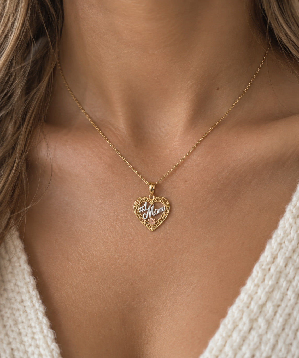 Gold #1 mom pendant  worn on female model 
